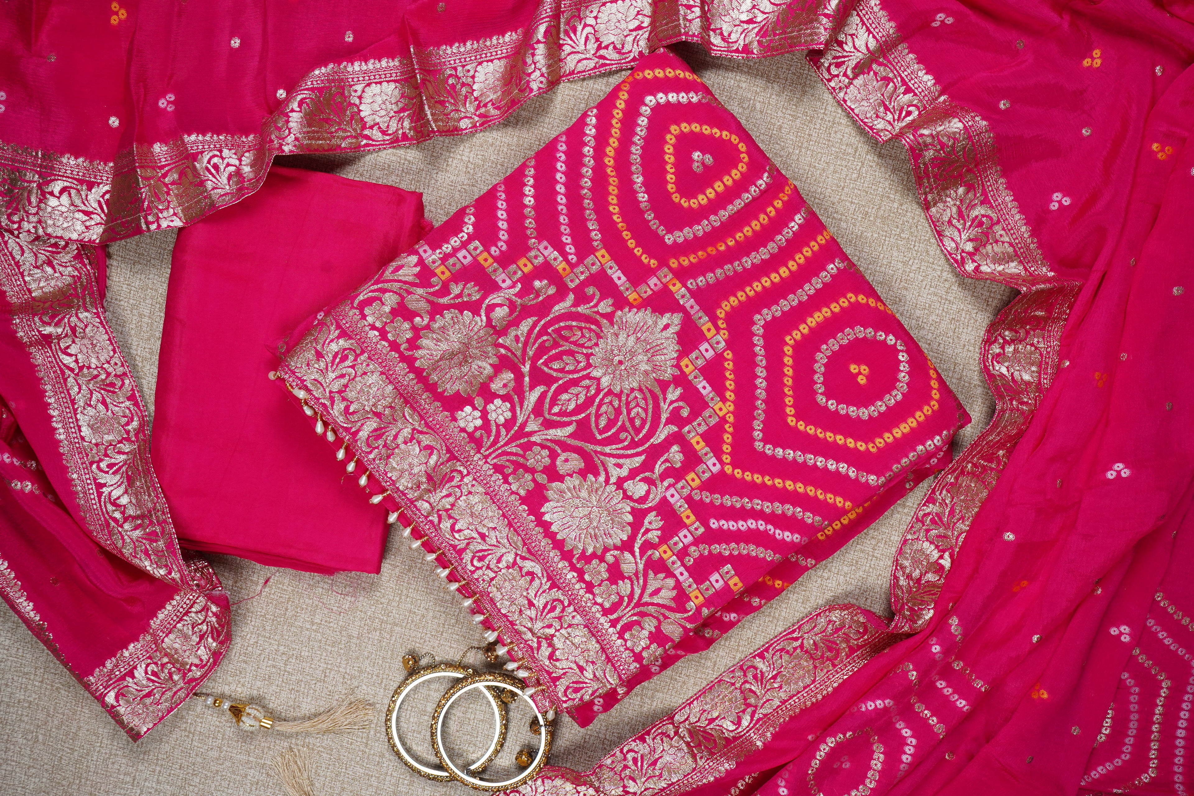 bright pink geometric bandhani banarasi silk unstiched salwar suit