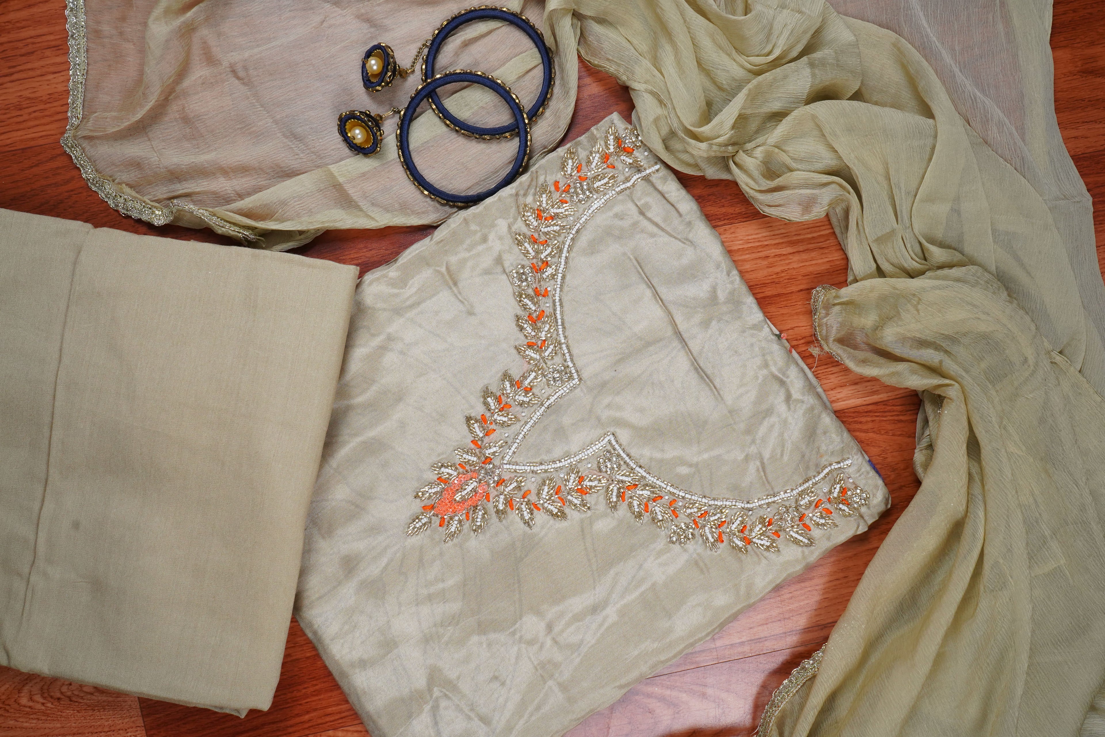 beige semi crepe unstitched salwar suit