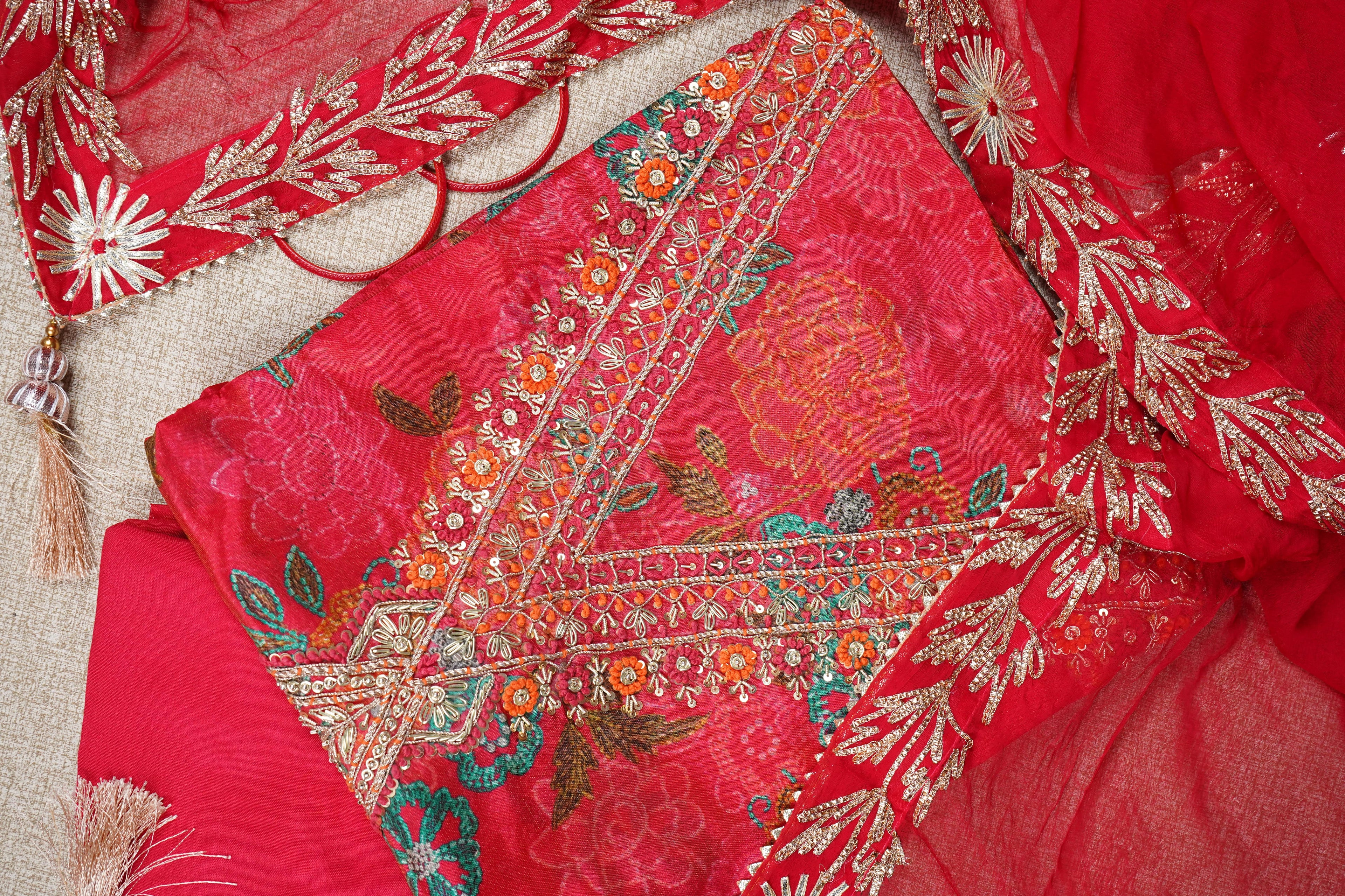 red chinon zardozi unstitched salwar suit