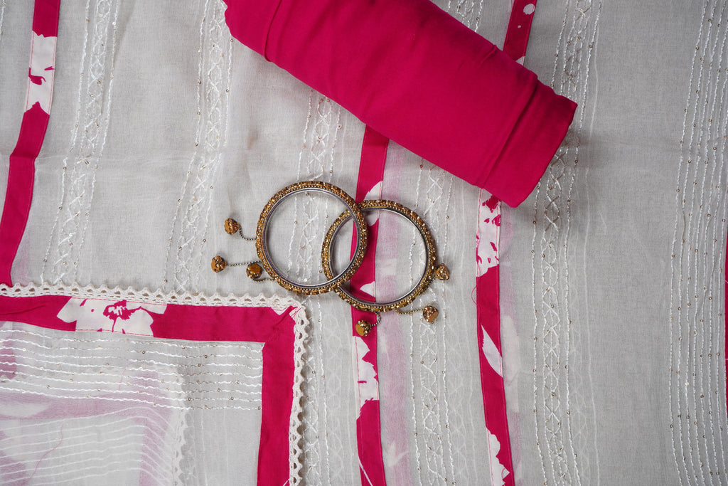 pink cotton printed unstitched salwar suit